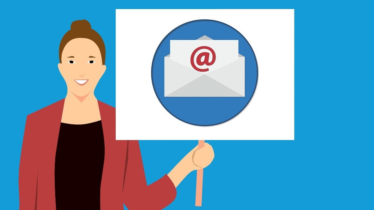 A graphic illustration of a white woman in a red suit holding up a sign with an email logo on it, against a blue background.